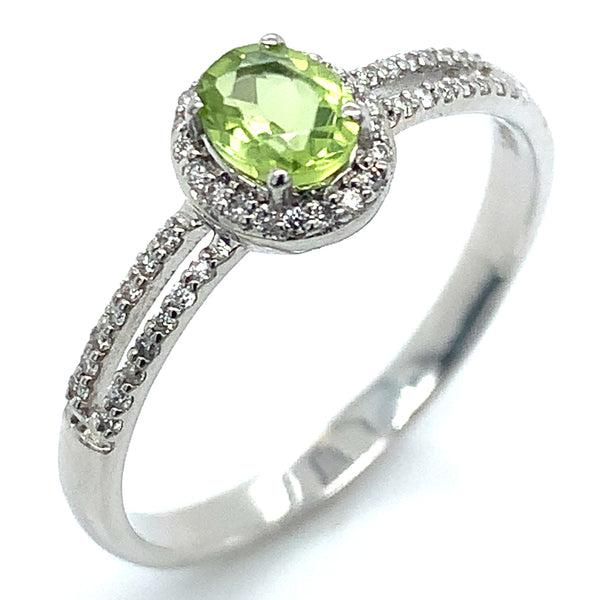 Anillo de Peridoto con diamantes en oro blanco 14k.