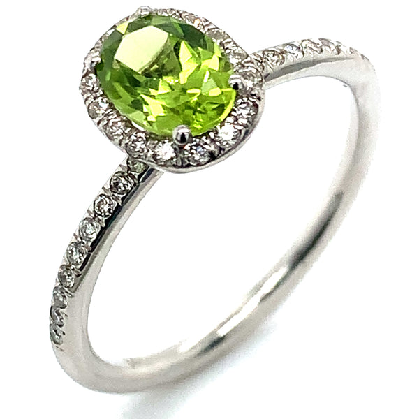 Anillo de Peridoto con diamantes en oro blanco 14k.