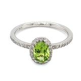 Anillo de Peridoto con diamantes en oro blanco 14k.