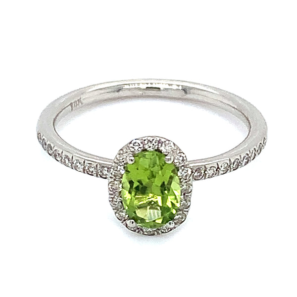 Anillo de Peridoto con diamantes en oro blanco 14k.