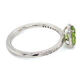 Anillo de Peridoto con diamantes en oro blanco 14k.