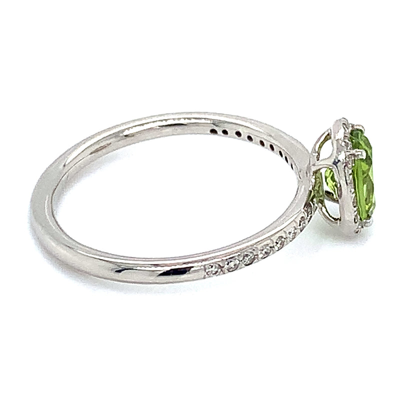Anillo de Peridoto con diamantes en oro blanco 14k.