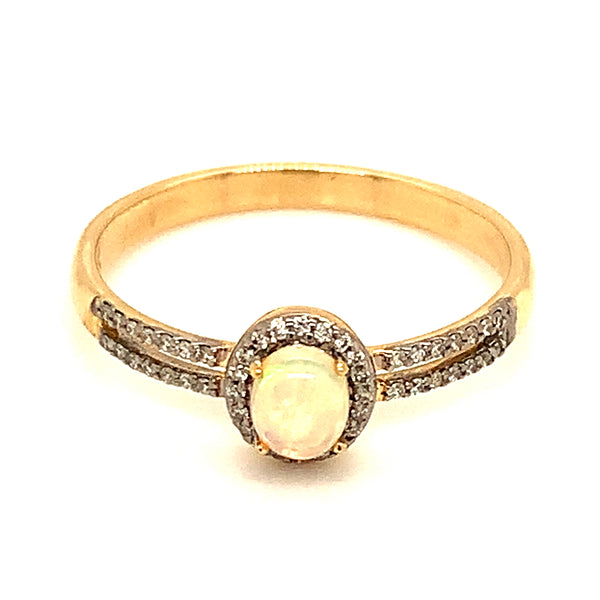 Anillo de Ópalo con diamantes en oro amarillo 14k.