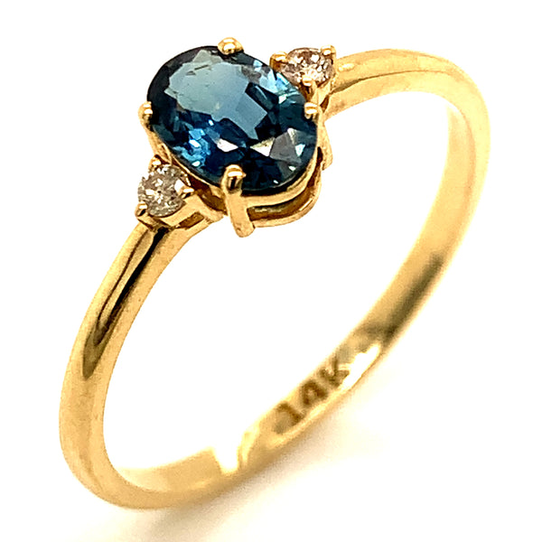 Anillo de Zafiro con diamantes en oro amarillo 14k.