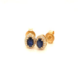 Aretes con Zafiros con diamantes en oro amarillo 14k.
