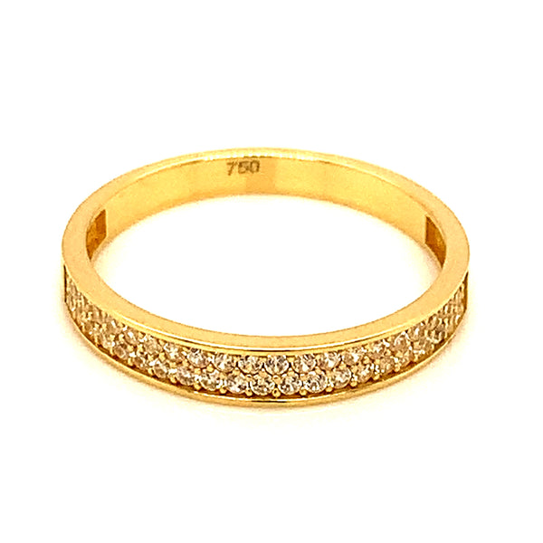 Banda con circones en oro amarillo 18kt.