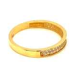 Banda con circones en oro amarillo 18kt.