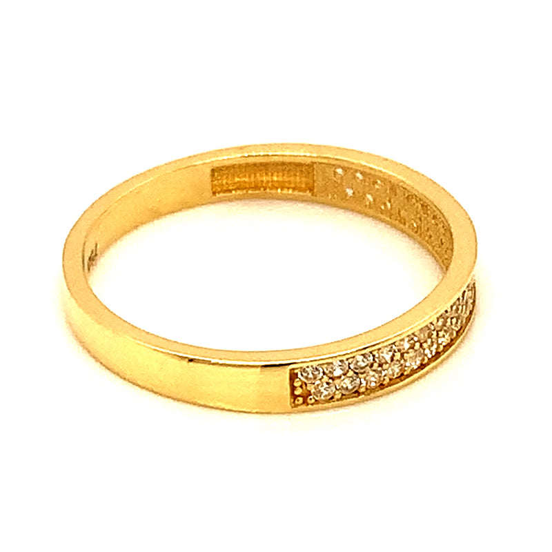 Banda con circones en oro amarillo 18kt.