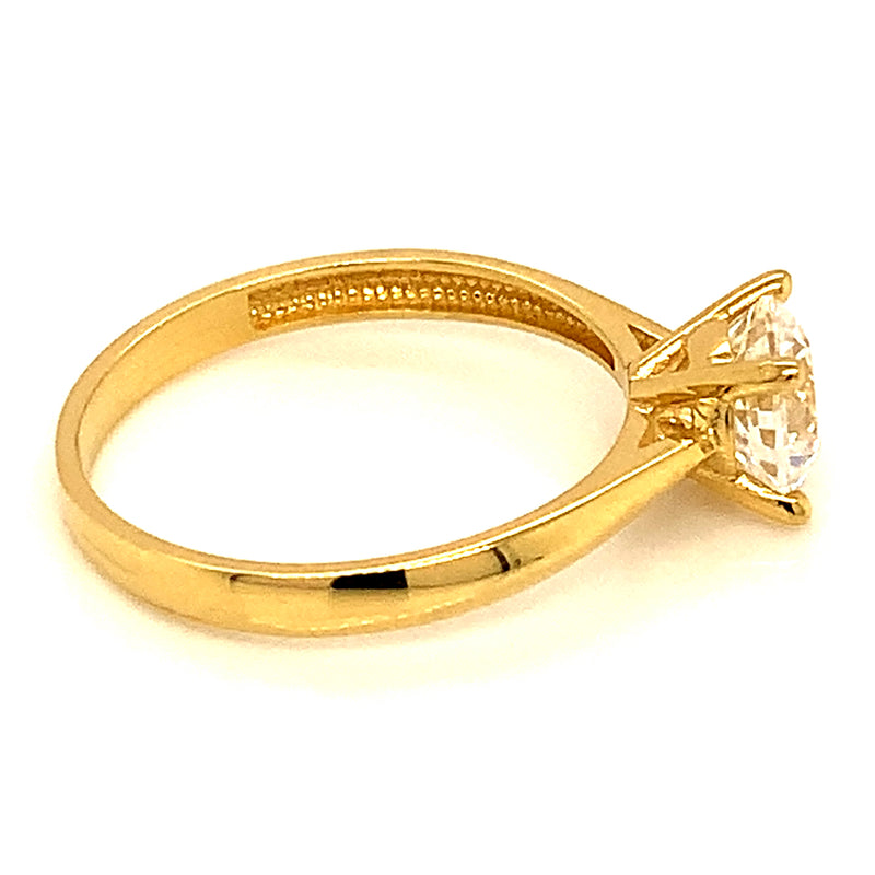Anillo solitario con circón en oro amarillo 18kt.