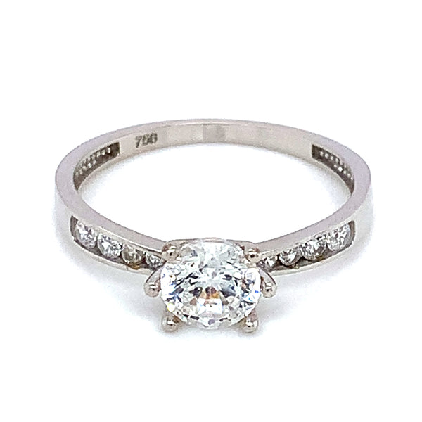 Anillo con circones en oro blanco 18kt.