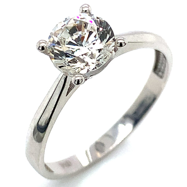 Anillo solitario con circón en oro blanco 18kt.