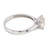 Anillo solitario con circón en oro blanco 18kt.