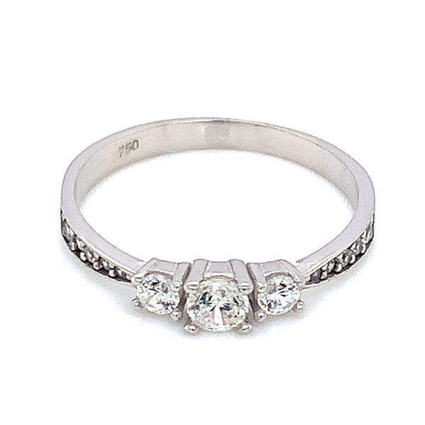 Anillo con circones en oro blanco 18kt.