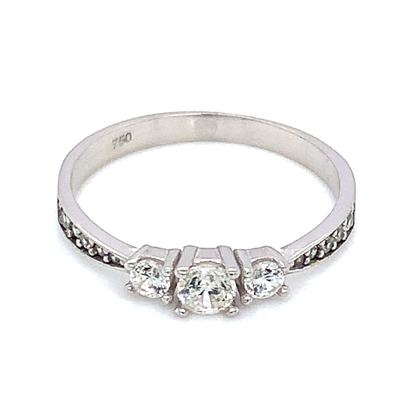 Anillo con circones en oro blanco 18kt.