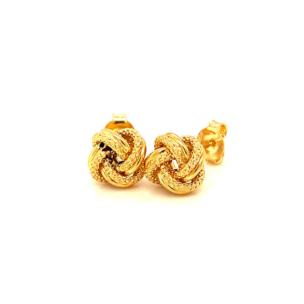Aretes (nudos) en oro amarillo 18kt.