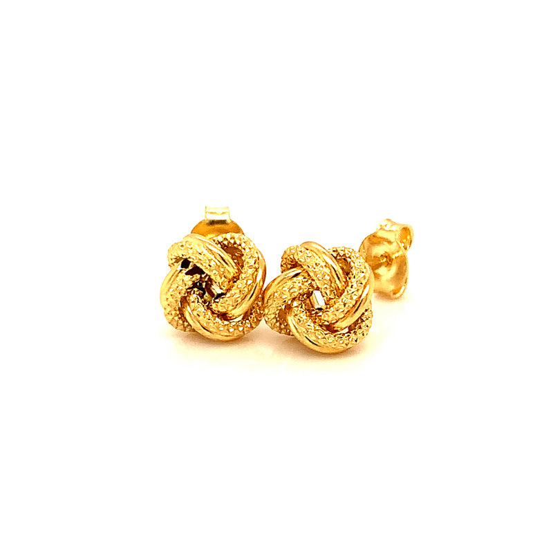 Aretes (nudos) en oro amarillo 18kt.