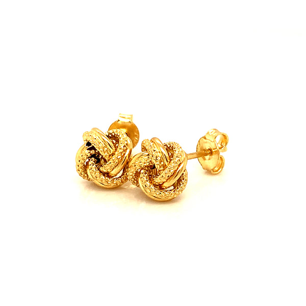 Aretes (nudos) en oro amarillo 18kt.