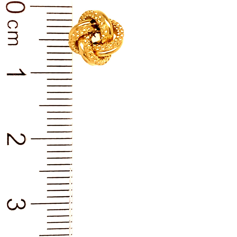 Aretes (nudos) en oro amarillo 18kt.