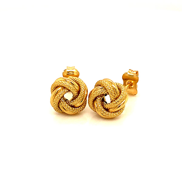 Aretes (nudos) en oro amarillo 18kt.