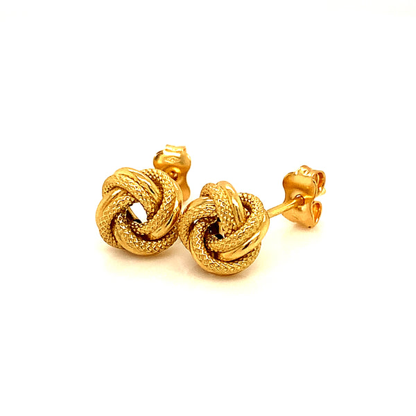 Aretes (nudos) en oro amarillo 18kt.