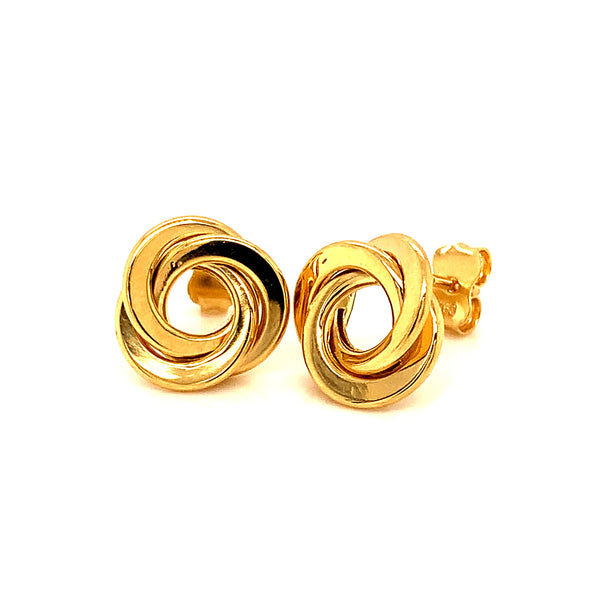 Aretes (nudos) en oro amarillo 18kt.