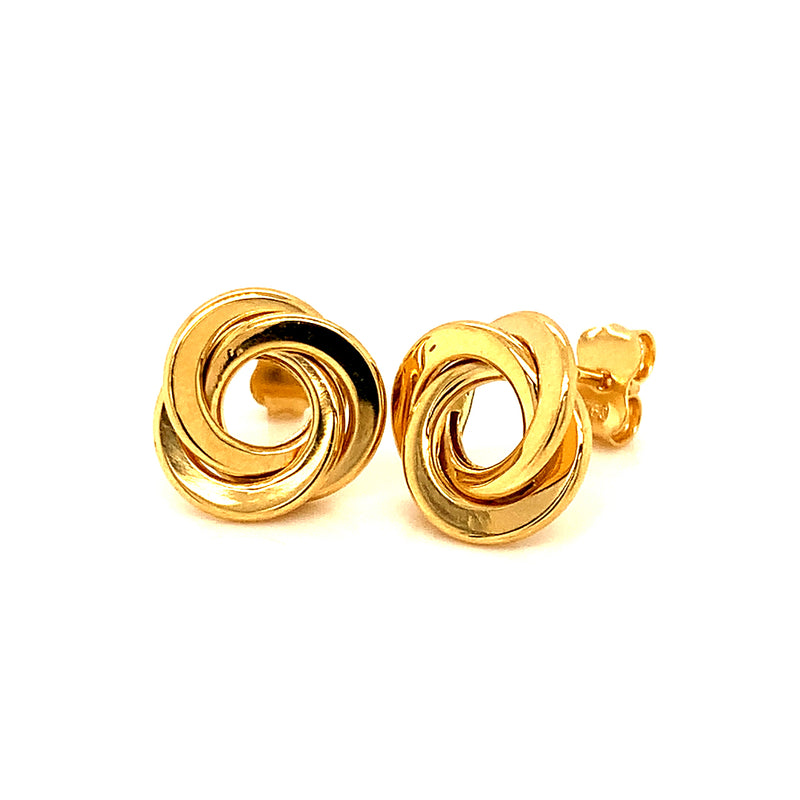 Aretes (nudos) en oro amarillo 18kt.