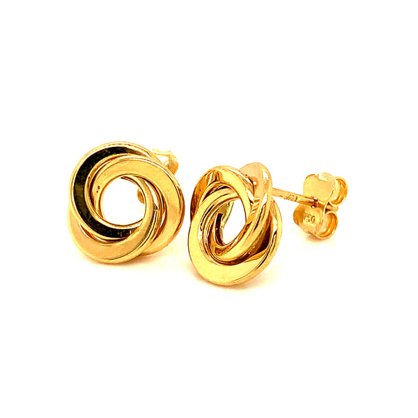 Aretes (nudos) en oro amarillo 18kt.