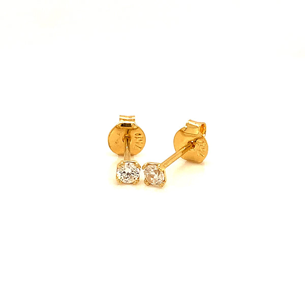 Aretes con circones en oro amarillo 18kt.