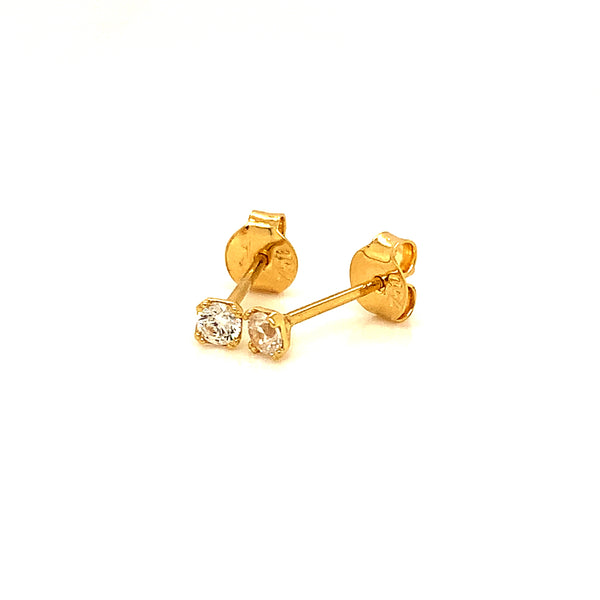 Aretes con circones en oro amarillo 18kt.