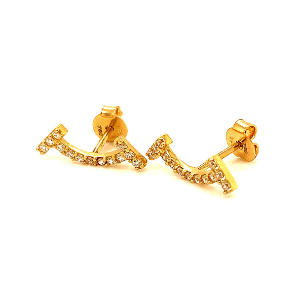 Aretes (sonrisa) con circones en oro amarillo 18kt.