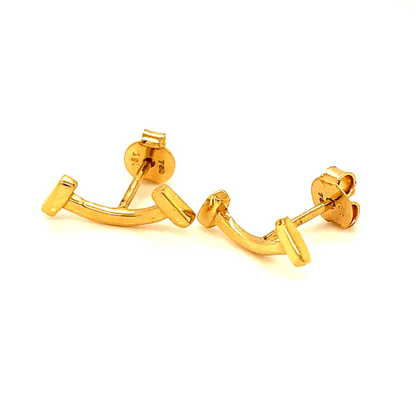 Aretes (sonrisa) en oro amarillo 18kt.