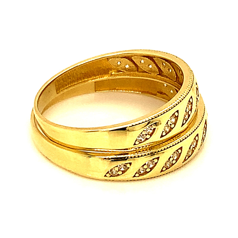 Dúo de bandas con circones en oro amarillo 10kt.