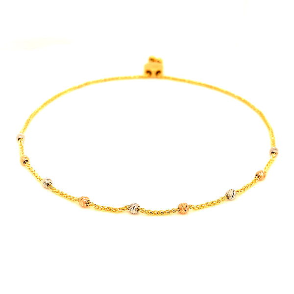 Pulsera (ajustable) en oro tres tonos 10kt.