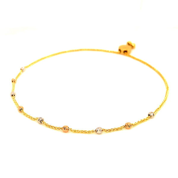 Pulsera (ajustable) en oro tres tonos 10kt.