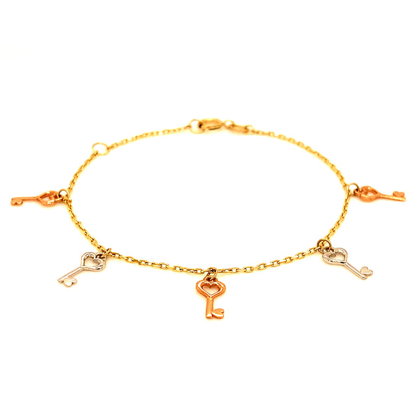 Pulsera para bebes en oro tres tonos 10kt. 13/15cm