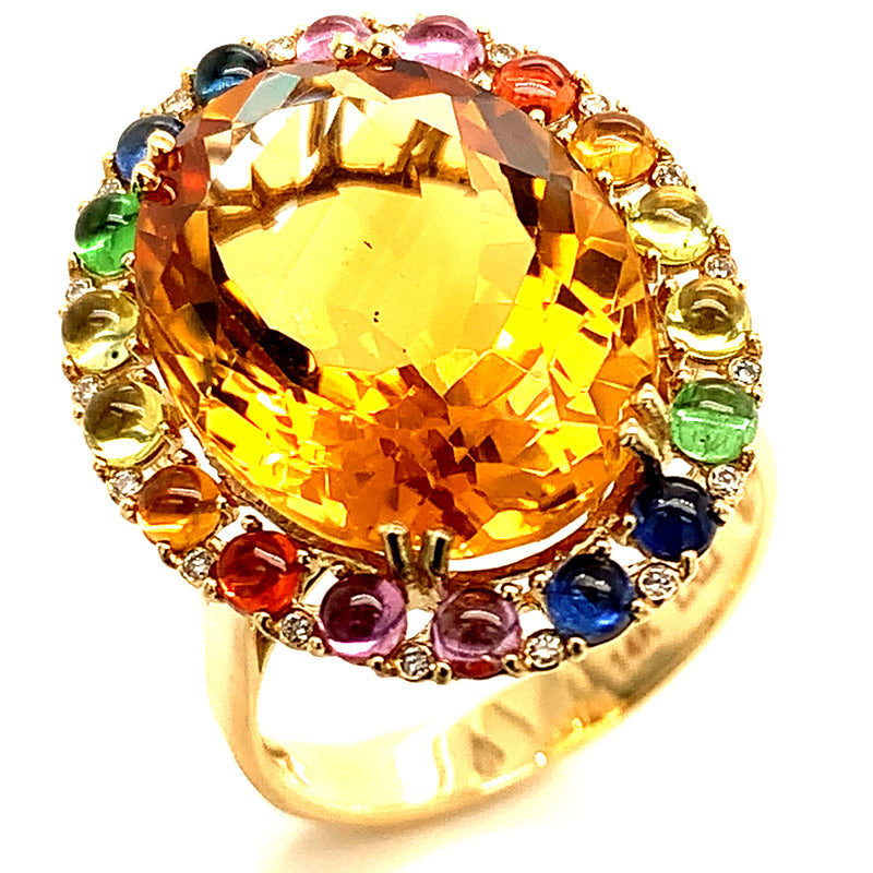 Anillo de citrino con zafiros y diamantes en oro amarillo 14kt.