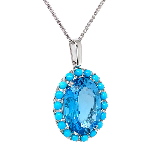Collar de topacio azul, turquesas y diamantes en oro blanco 14kt.