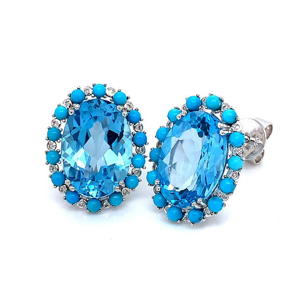 Aretes de topacio azul, turquesas y diamantes en oro blanco 14kt.