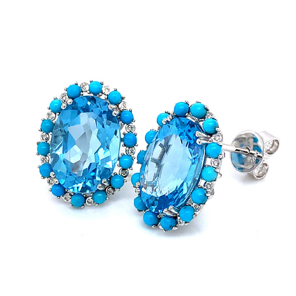 Aretes de topacio azul, turquesas y diamantes en oro blanco 14kt.
