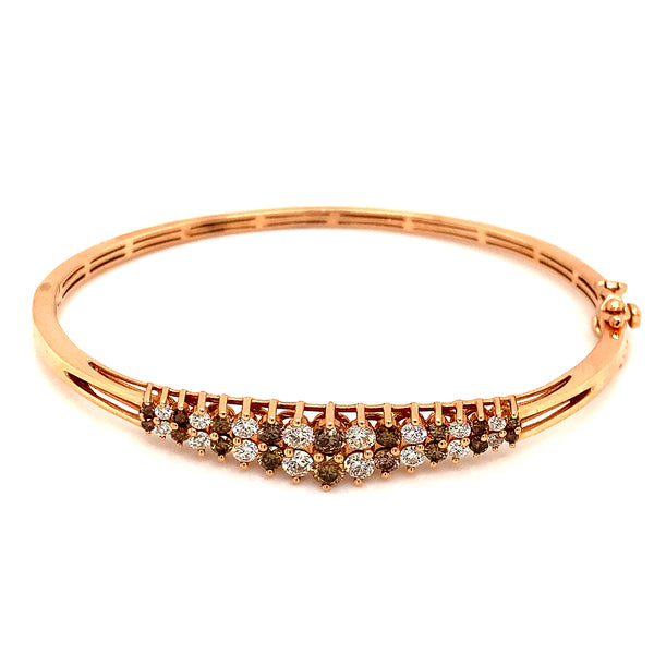 Caña con diamantes coñac y blancos en oro rosado 14kt.