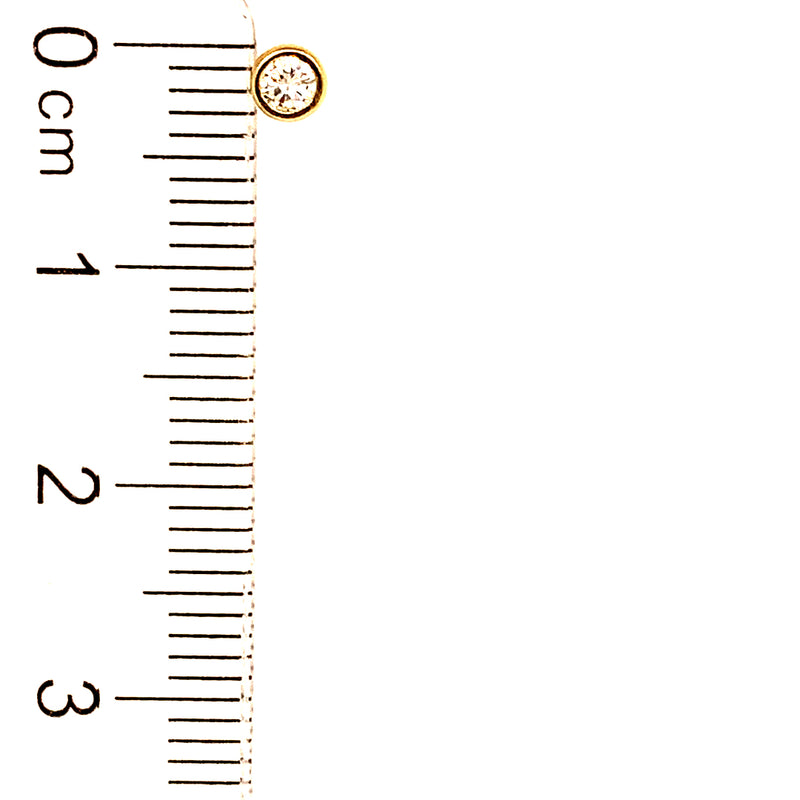 Aretes para bebés con circones en oro amarillo 18kt.