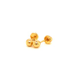 Aretes para bebés (bolitas) en oro amarillo 18kt.