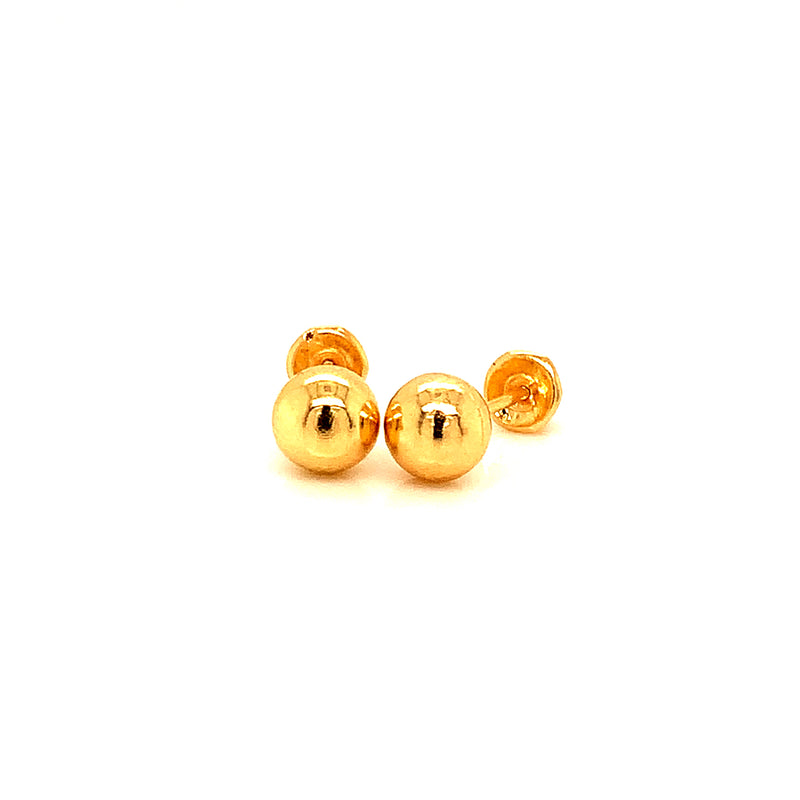 Aretes para bebés (bolitas) en oro amarillo 18kt.