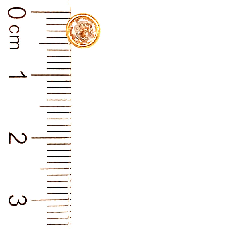 Aretes para bebés con circones en oro amarillo 18kt.