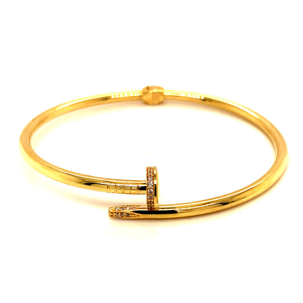 Caña (clavo) (HC) con circones en oro amarillo 10kt.