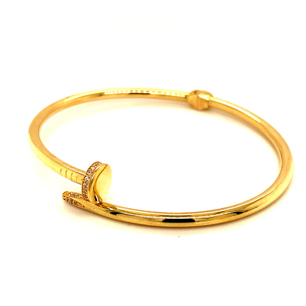 Caña (clavo) (HC) con circones en oro amarillo 10kt.