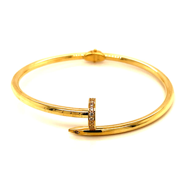 Caña (clavo) (HC) con circones en oro amarillo 10kt.