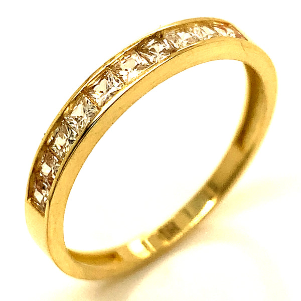 Banda con circones en oro amarillo 10kt.