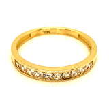 Banda con circones en oro amarillo 10kt.