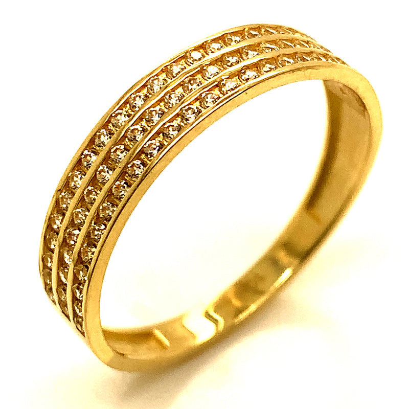 Banda con circones en oro amarillo 10kt.